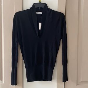 Deep v neck knit sheer sweater from Zara.